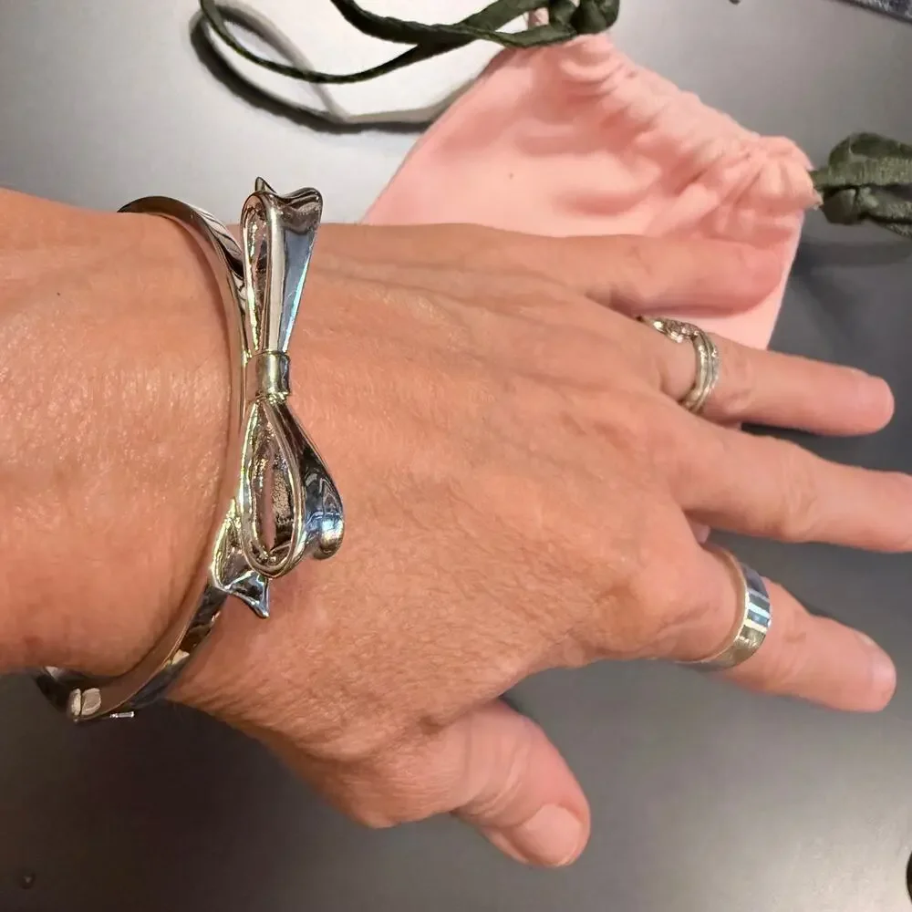 Kate Spade Love Notes Silver Tone Large Bow Hinge Bracelet